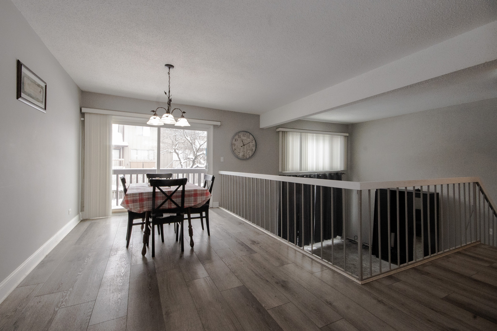 746 East Devon Avenue Roselle, IL 60172 - Photo 4 of 24 a view of a dining room with furniture window and wooden floor