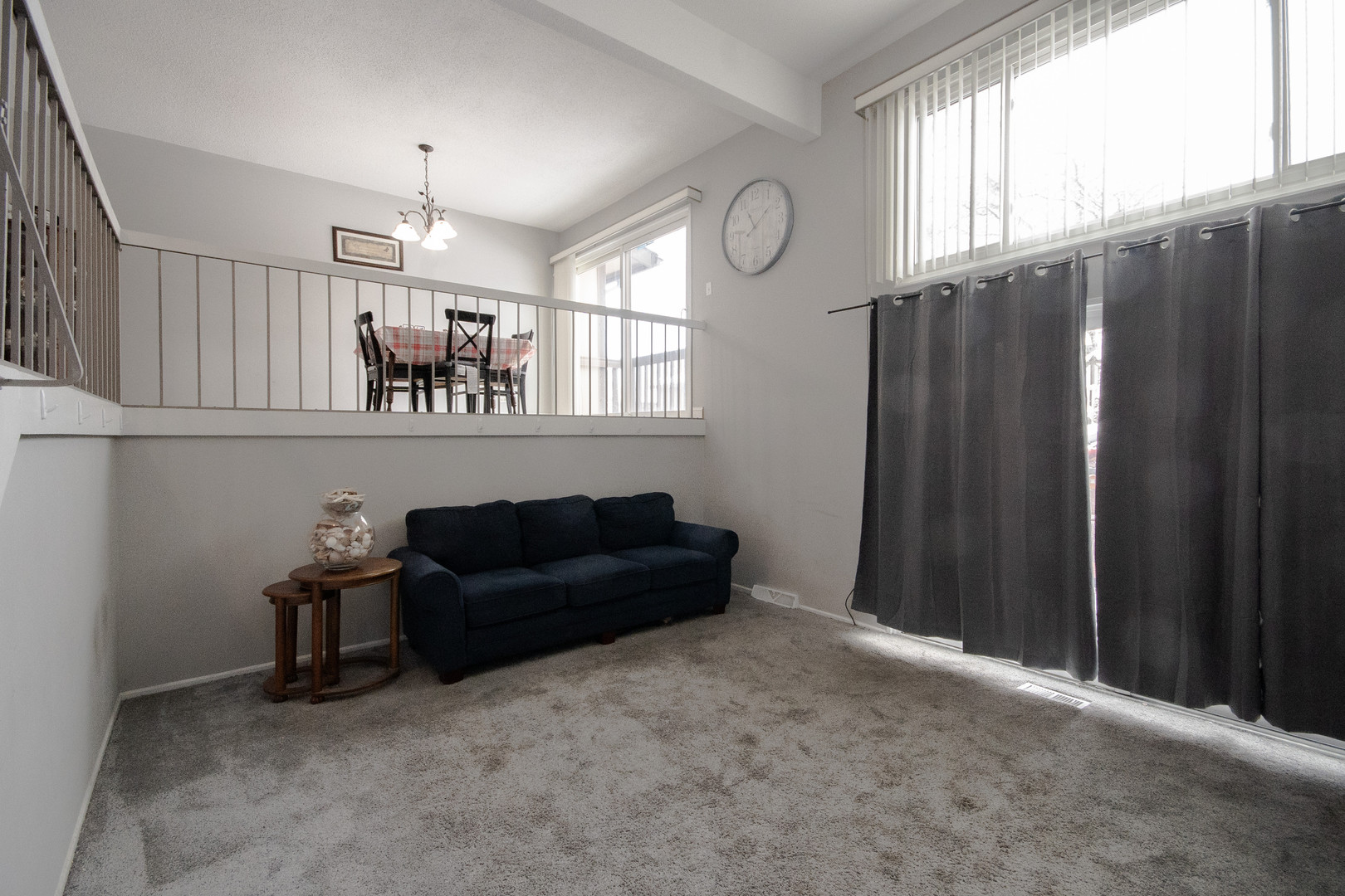746 East Devon Avenue Roselle, IL 60172 - Photo 6 of 24 a living room with furniture and a window