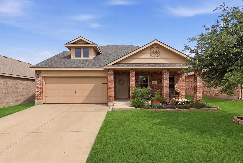 806 Silver Street Princeton, TX 75407 - Photo 2 of 29 Brick and siding exterior featuring a covered front porch with brick columns