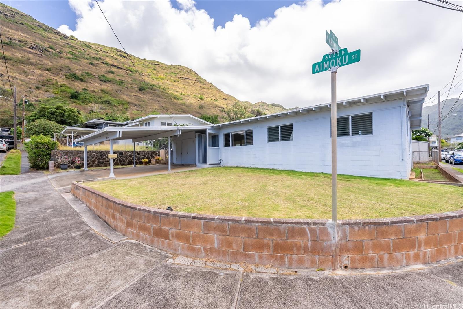 6014 Aimoku Street Honolulu, HI 96821 - Photo 2 of 25 6014 Aimoku sits on a manicured corner lot.
