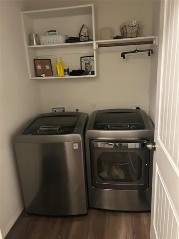 a utility room with washer and dryer