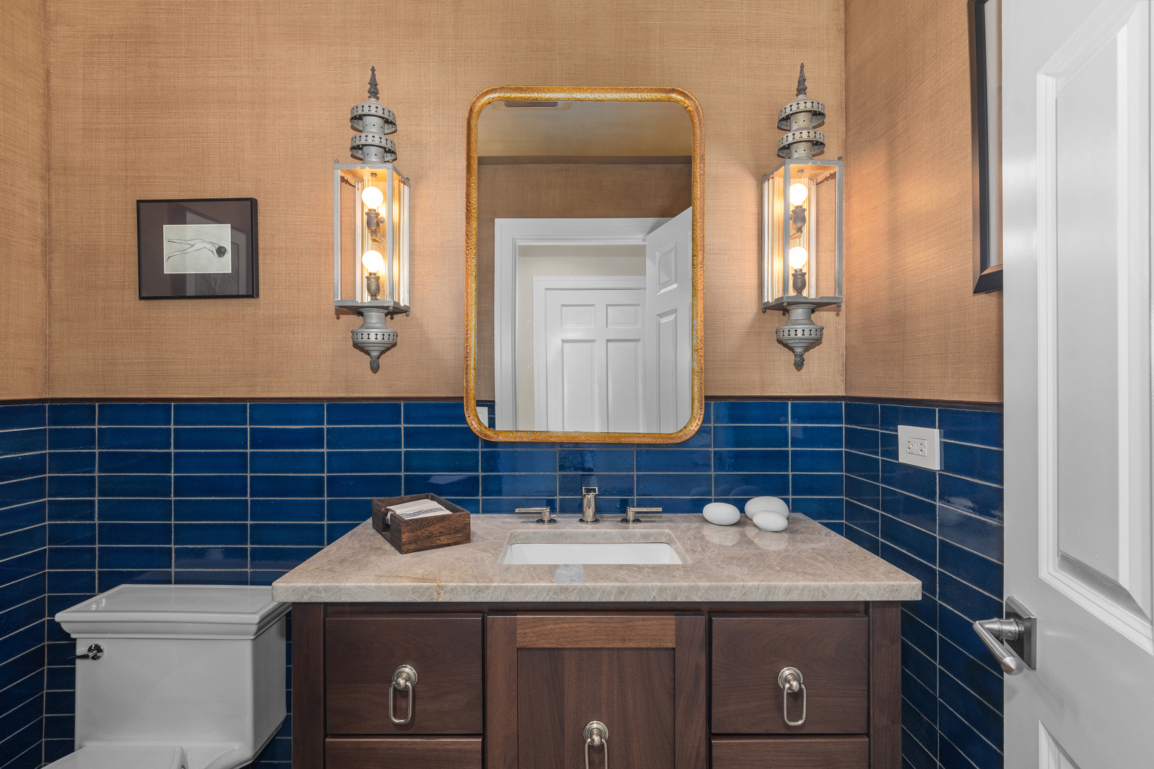 20 Colony Lane Deerfield, IL 60015 - Photo 12 of 33 a bathroom with a sink a toilet and mirror
