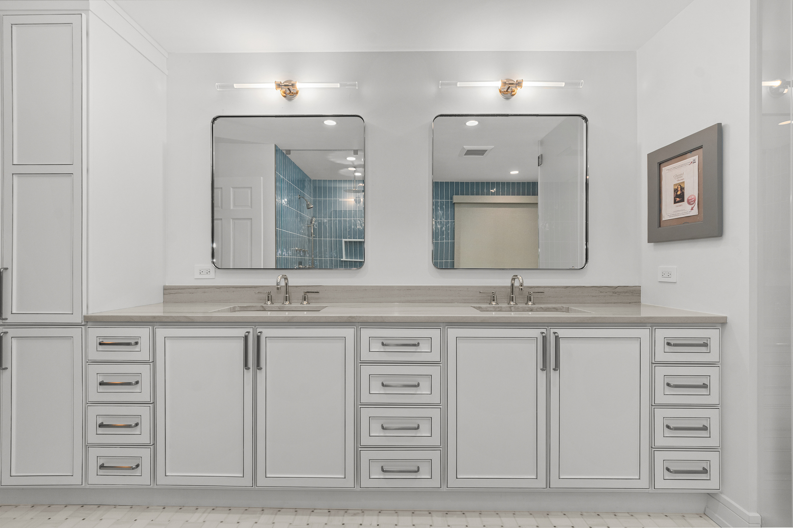 20 Colony Lane Deerfield, IL 60015 - Photo 14 of 33 a bathroom with a double vanity sink and a mirror
