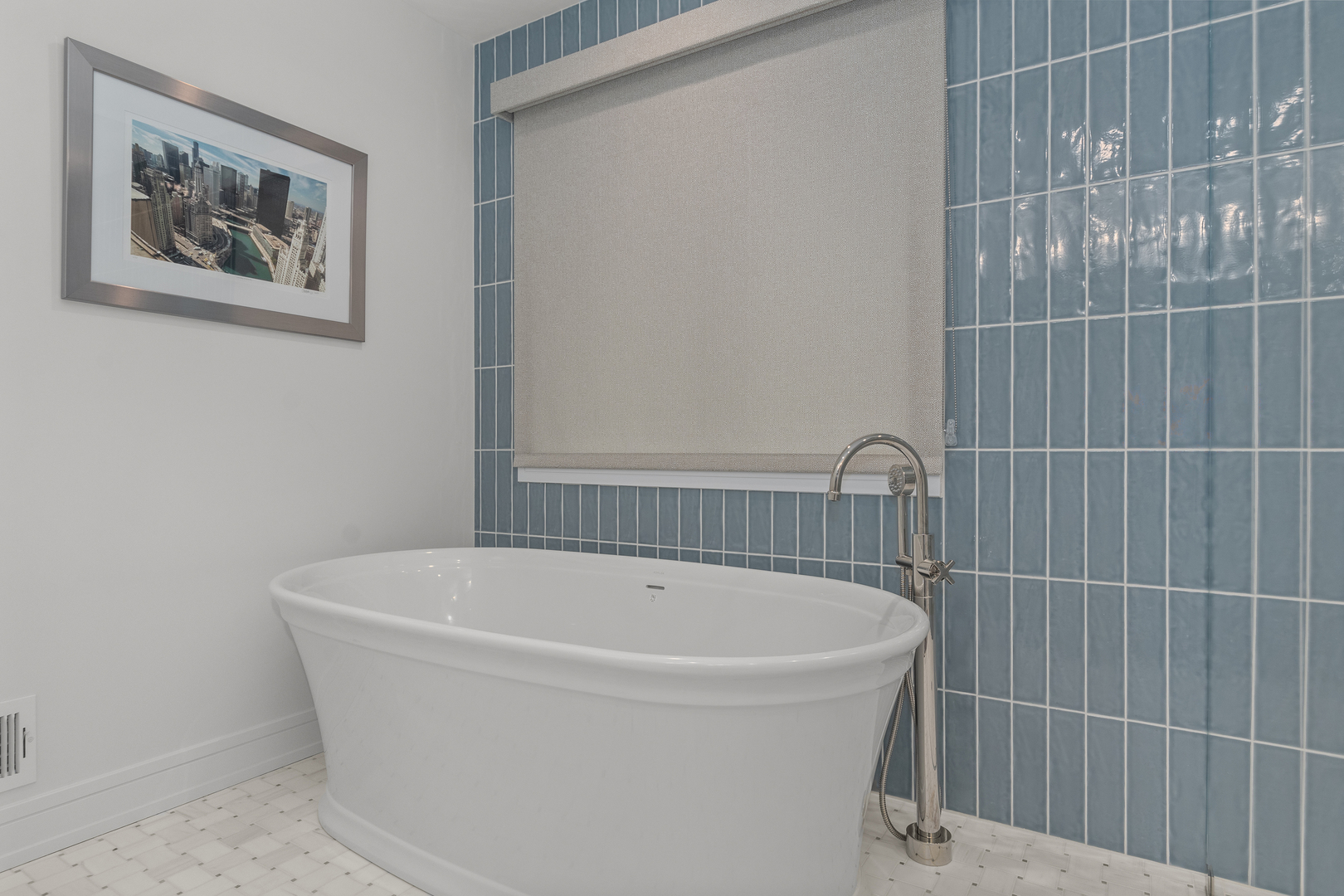 20 Colony Lane Deerfield, IL 60015 - Photo 17 of 33 a white bath tub sitting in a bathroom