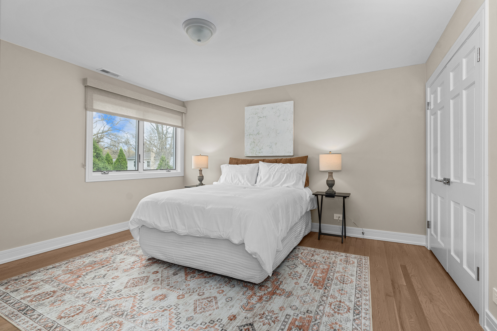 20 Colony Lane Deerfield, IL 60015 - Photo 25 of 33 a bedroom with a bed and a window