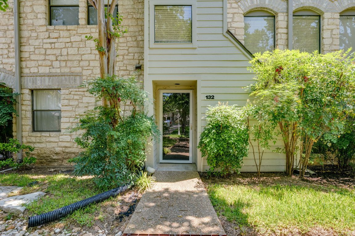 9226 Jollyville Road, Unit 132 Austin, TX 78759 - Photo 2 of 25 Entrance to property with stone siding