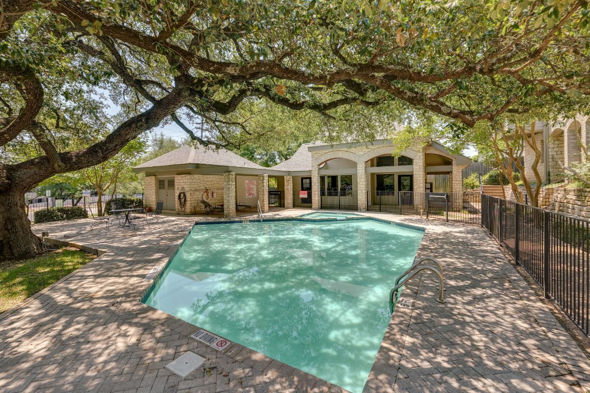 9226 Jollyville Road, Unit 132 Austin, TX 78759 - Photo 22 of 25 Community pool featuring a patio