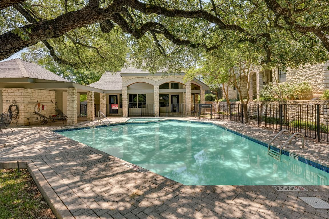 9226 Jollyville Road, Unit 132 Austin, TX 78759 - Photo 23 of 25 View of swimming pool featuring a patio and a pool with connected hot tub