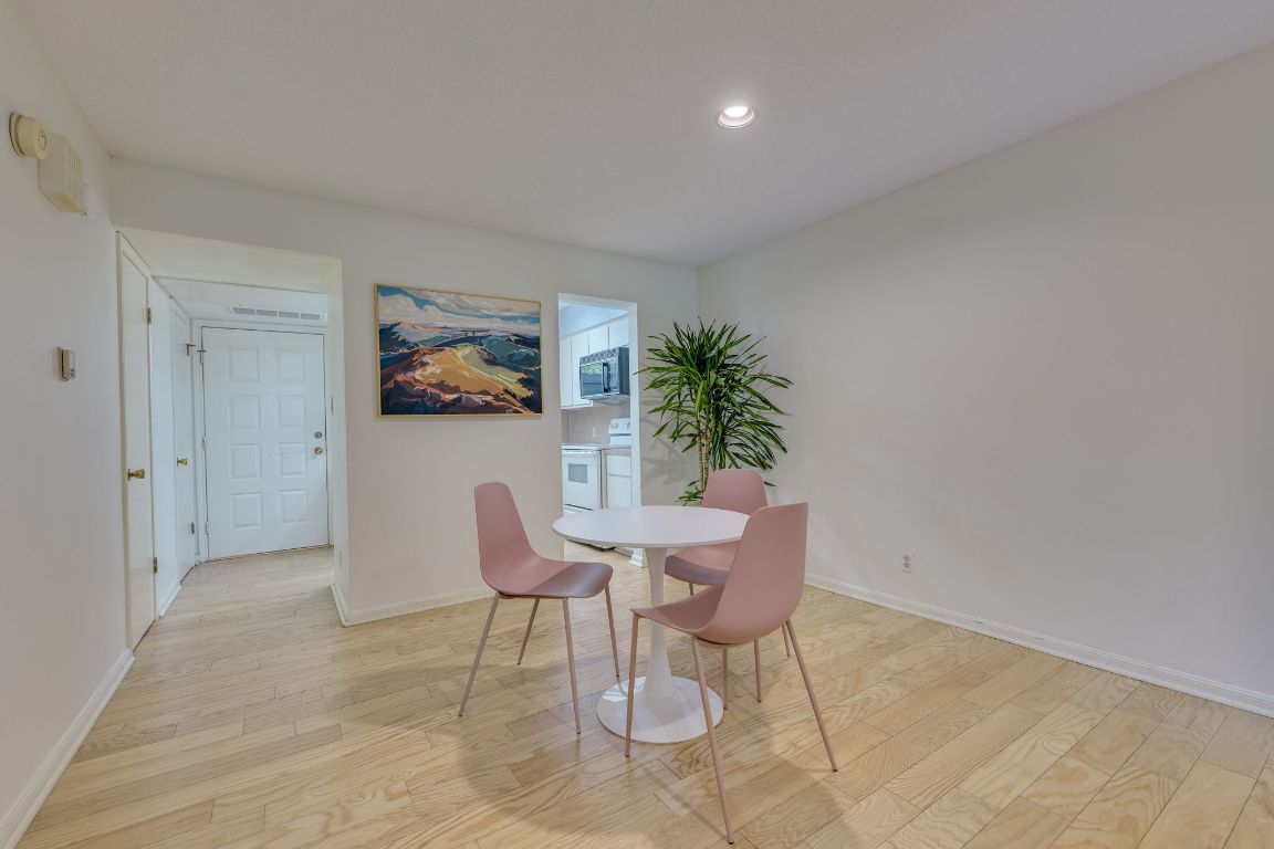 9226 Jollyville Road, Unit 132 Austin, TX 78759 - Photo 9 of 25 Dining space featuring light wood-type flooring and recessed lighting