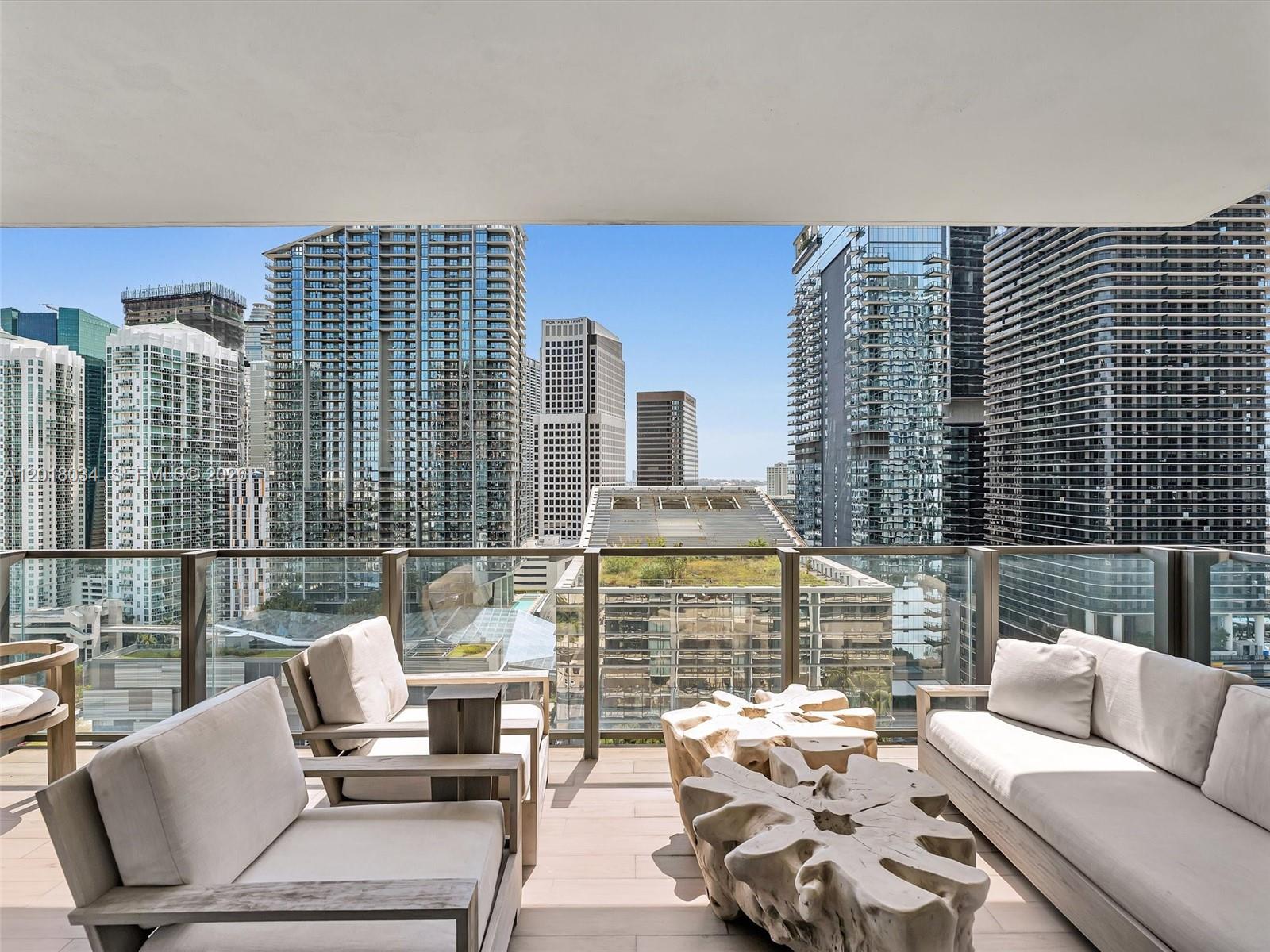 88 Southwest 7th Street, Unit 2011 Miami, FL 33130 - Photo 21 of 55 a view of roof deck with outdoor seating and city view
