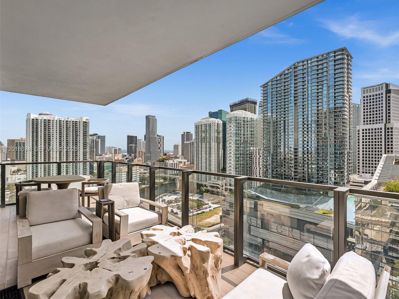 88 Southwest 7th Street, Unit 2011 Miami, FL 33130 - Photo 23 of 55 a balcony with furniture