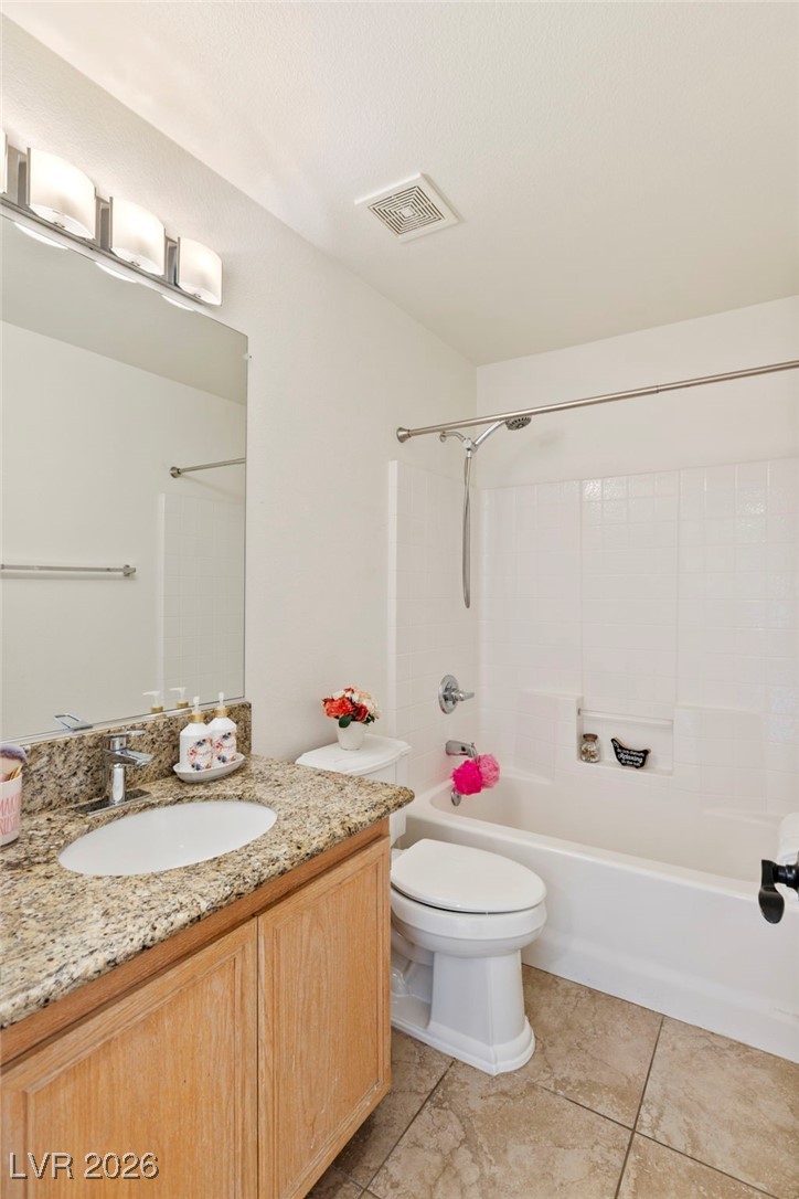 1131 Cathedral Ridge Street Henderson, NV 89052 - Photo 12 of 32 Hall/guest bathroom with upgraded light fixture and drop-in sink