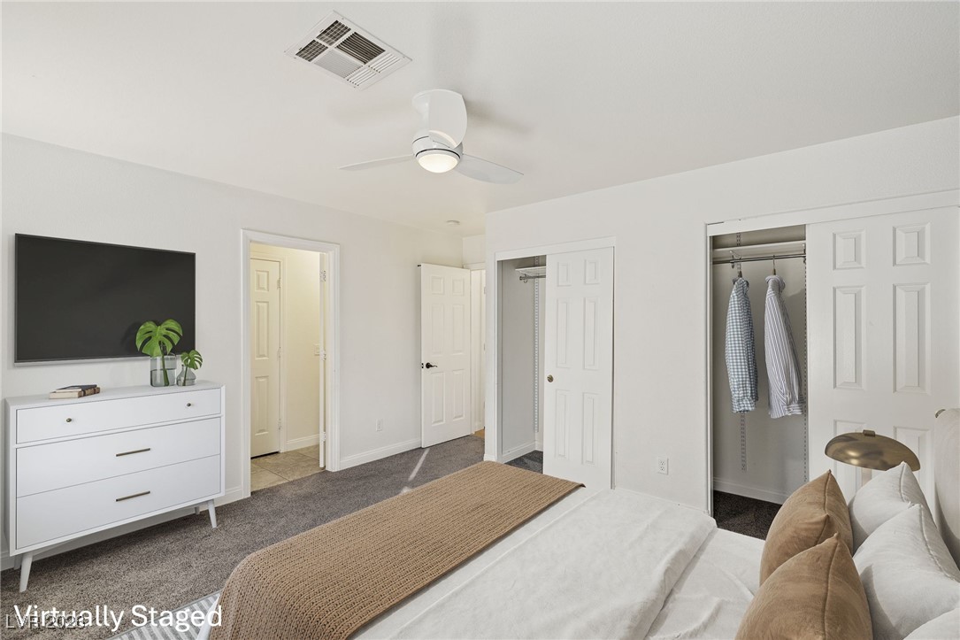1131 Cathedral Ridge Street Henderson, NV 89052 - Photo 19 of 32 Spacious primary bedroom featuring double closets for plenty of storage