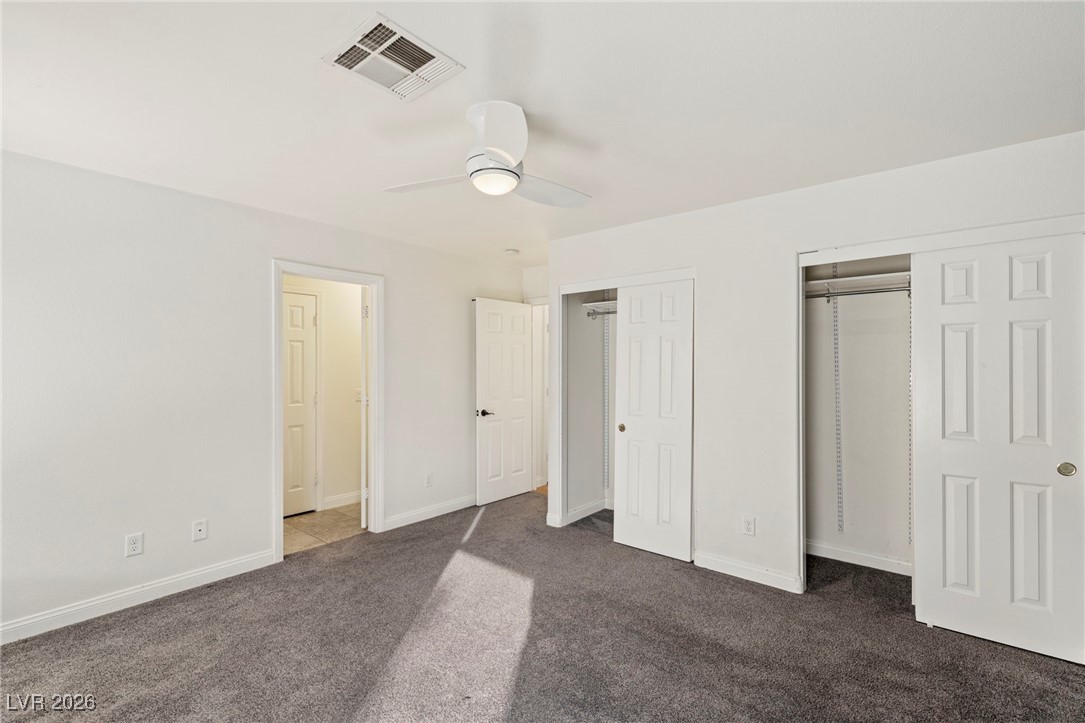 1131 Cathedral Ridge Street Henderson, NV 89052 - Photo 21 of 32 Primary Bedroom with a door to the bathroom