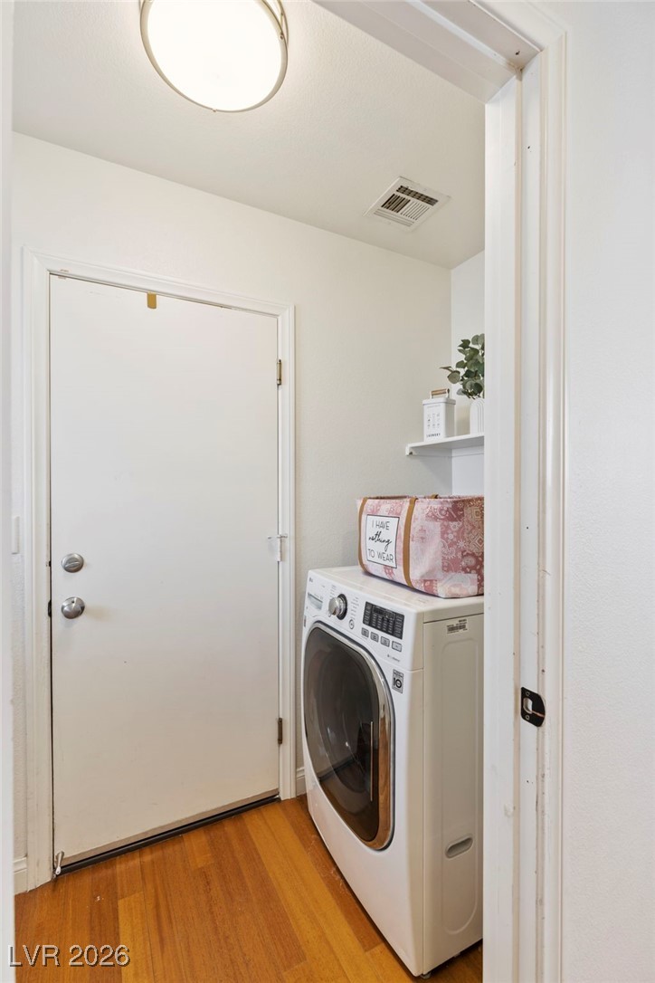 1131 Cathedral Ridge Street Henderson, NV 89052 - Photo 23 of 32 All-in-one washer/dryer unit—space-saving and convenient