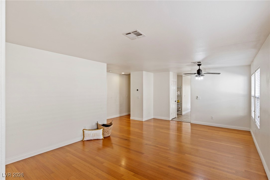 1131 Cathedral Ridge Street Henderson, NV 89052 - Photo 5 of 32 Spacious living room flows into the dining area ideal for gatherings and entertaining