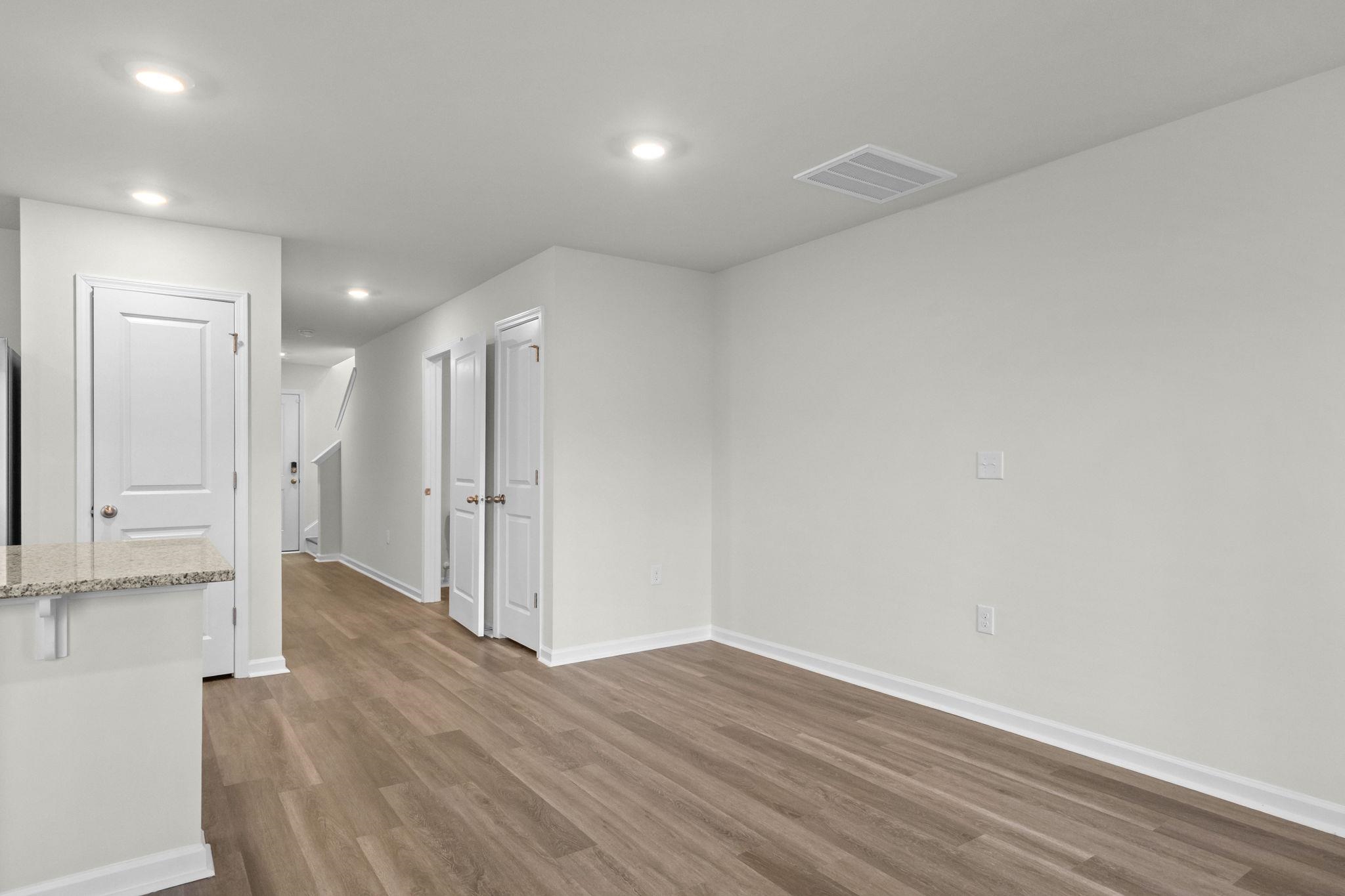 640 Golden Resin Road Conway, SC 29526 - Photo 13 of 38 Spare room with dark wood-style flooring and recessed lighting