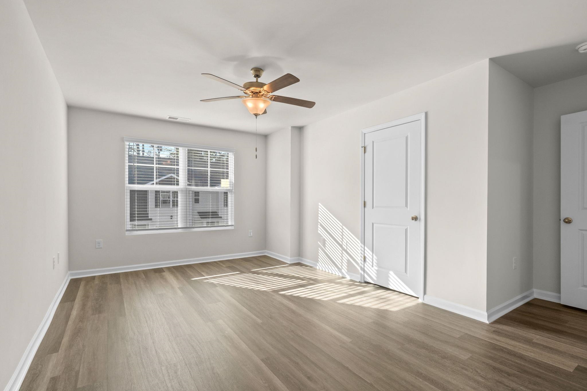 640 Golden Resin Road Conway, SC 29526 - Photo 18 of 38 Unfurnished room featuring wood finished floors and a ceiling fan