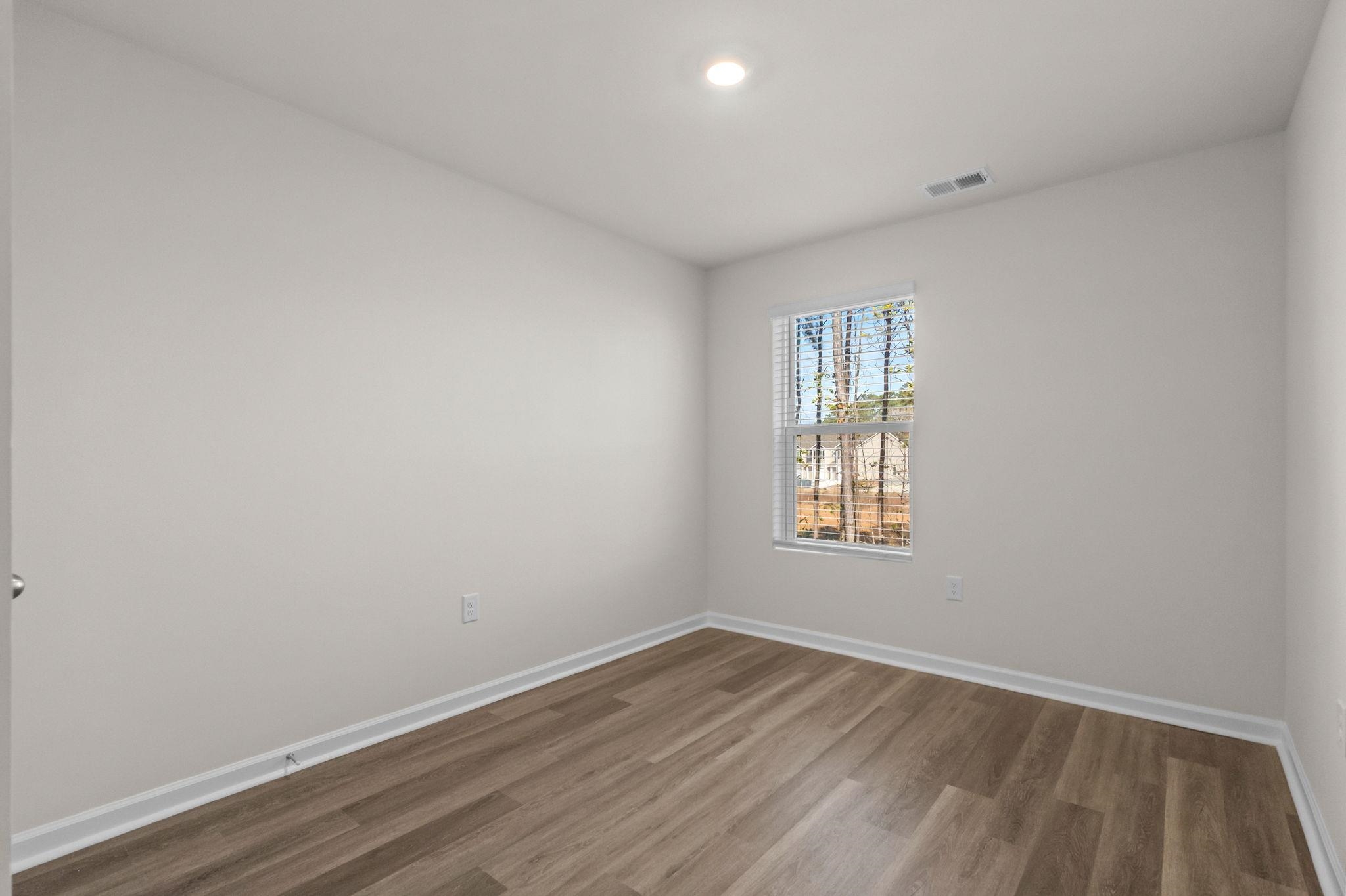 640 Golden Resin Road Conway, SC 29526 - Photo 23 of 38 Empty room with baseboards and wood finished floors