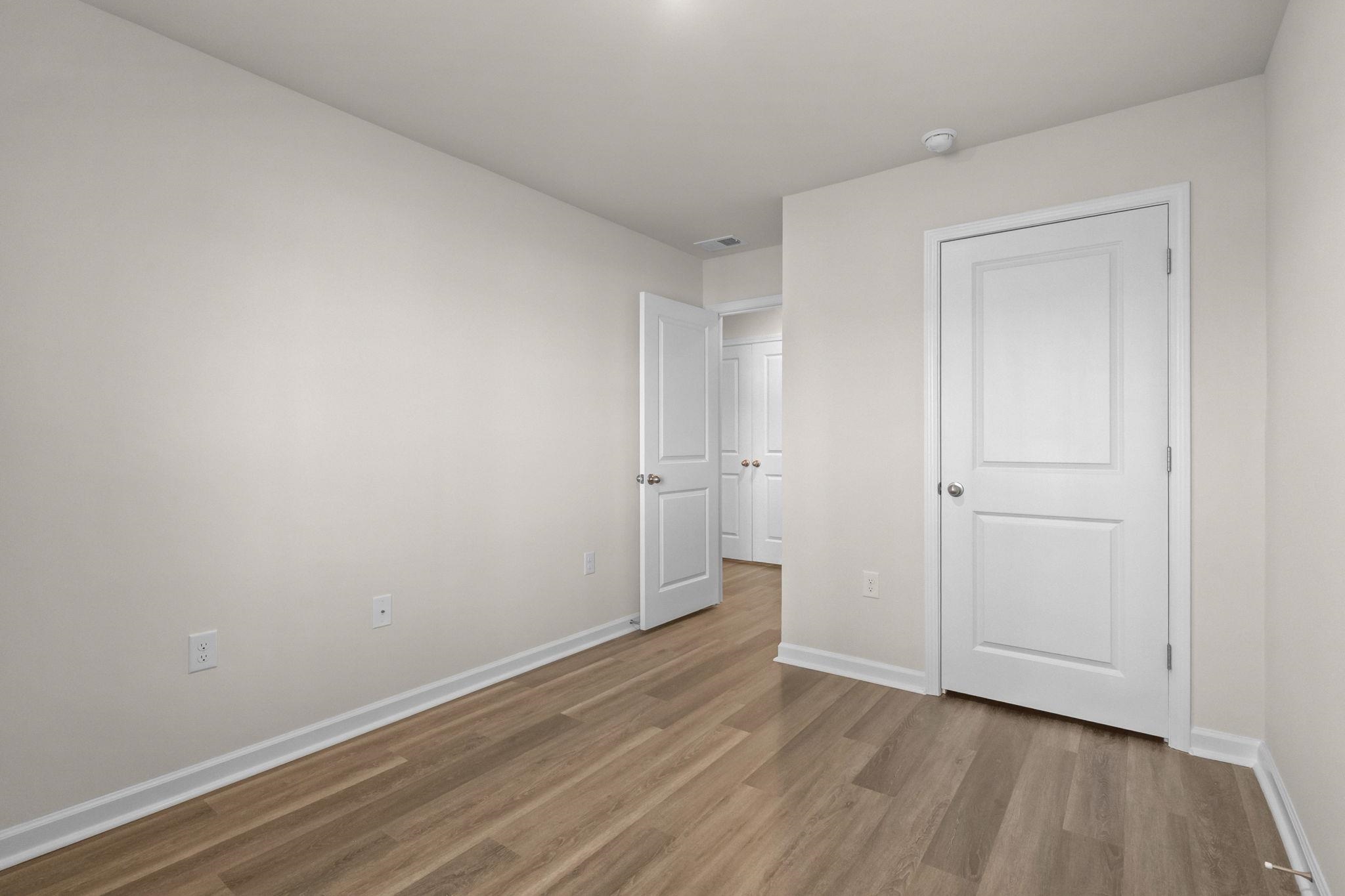640 Golden Resin Road Conway, SC 29526 - Photo 24 of 38 Unfurnished bedroom with baseboards and wood finished floors
