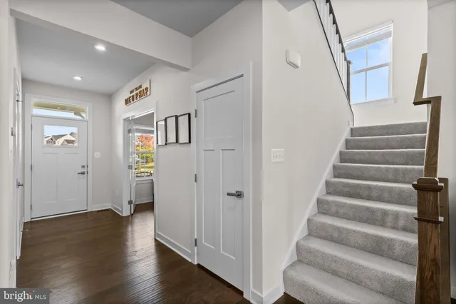 a view of a hallway with windows