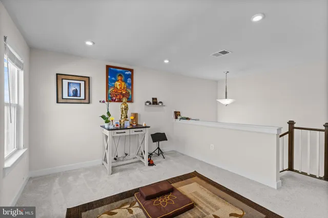 a bathroom with a shower and a sink