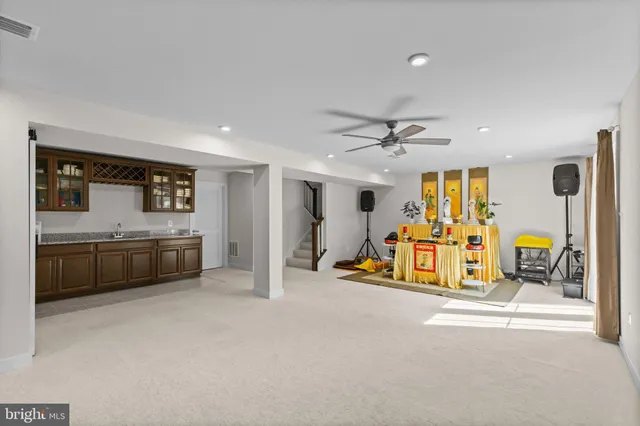 a front view of a house with swimming pool