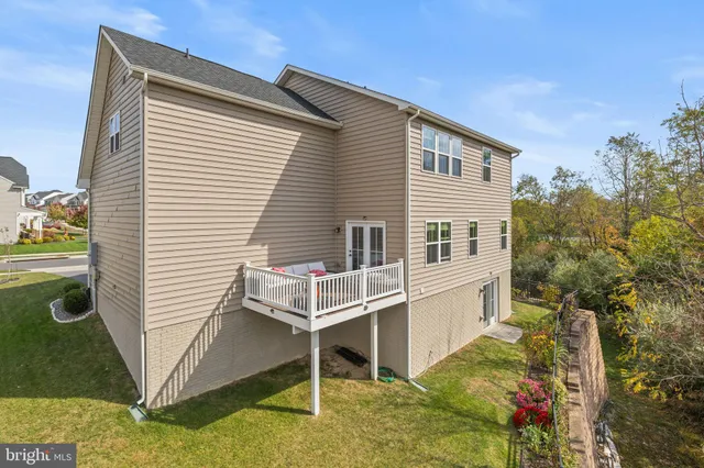 a group of people sitting outside of a building