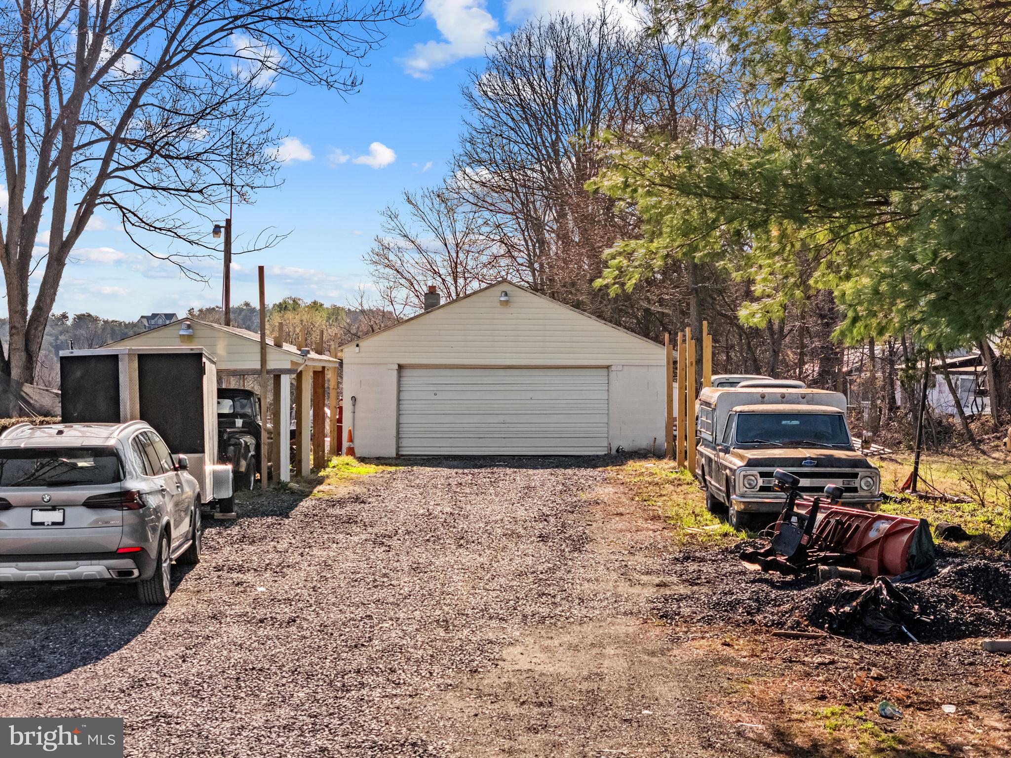 110 Bucks Mill Road Strasburg, VA 22657 - Photo 15 of 53 a car parked in front of a house