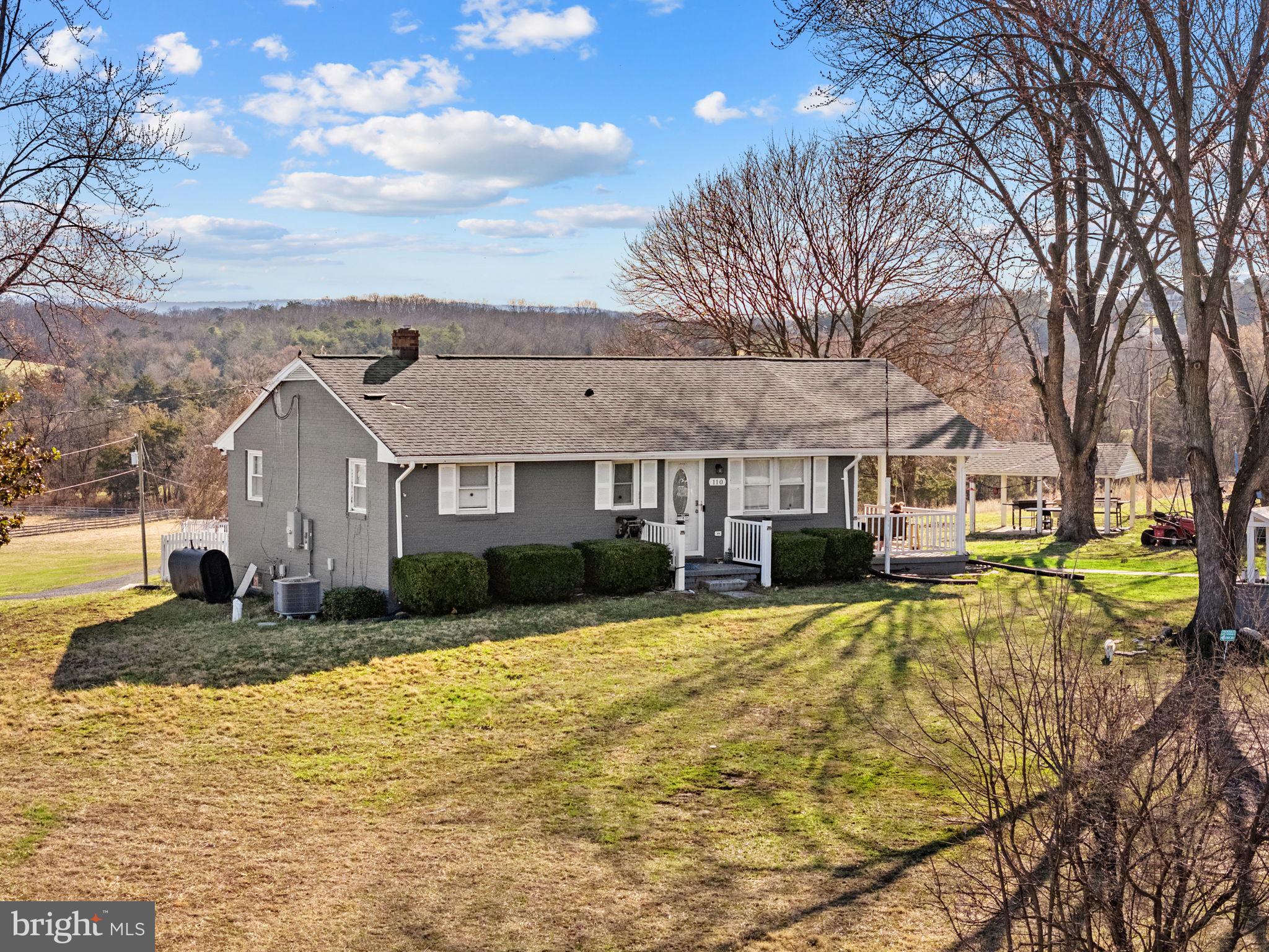 110 Bucks Mill Road Strasburg, VA 22657 - Photo 16 of 53 a front view of a house with swimming pool and furniture