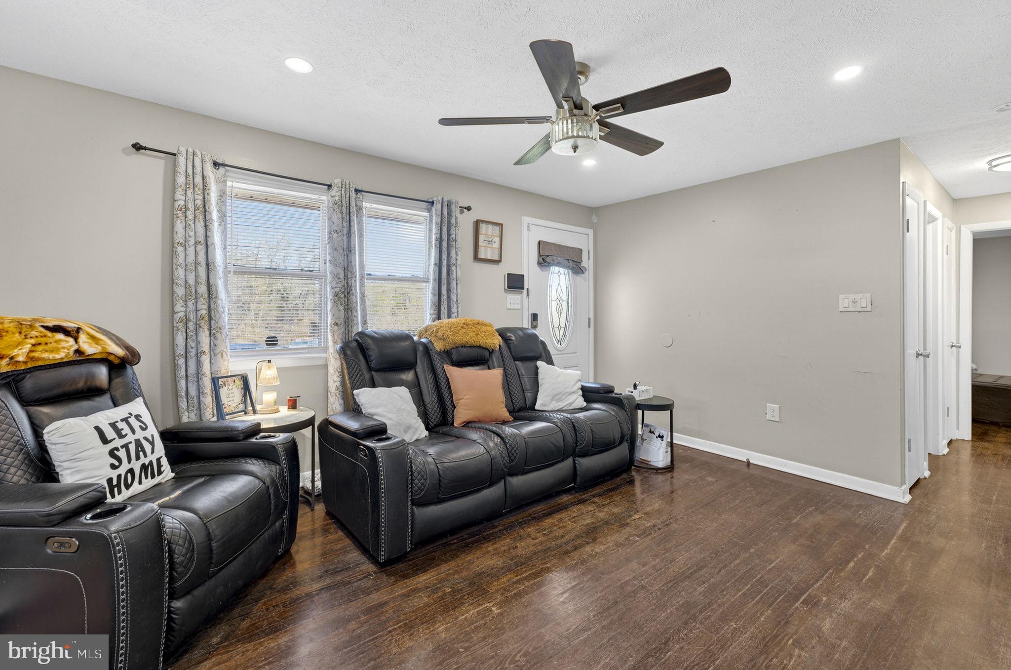 110 Bucks Mill Road Strasburg, VA 22657 - Photo 20 of 53 a living room with furniture and a large window