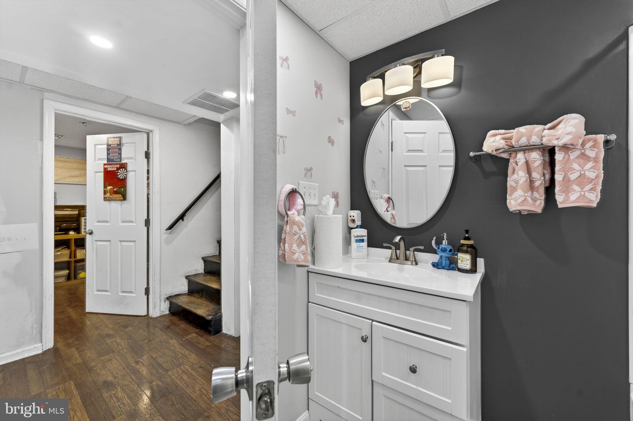 110 Bucks Mill Road Strasburg, VA 22657 - Photo 27 of 53 a bathroom with a sink mirror and vanity