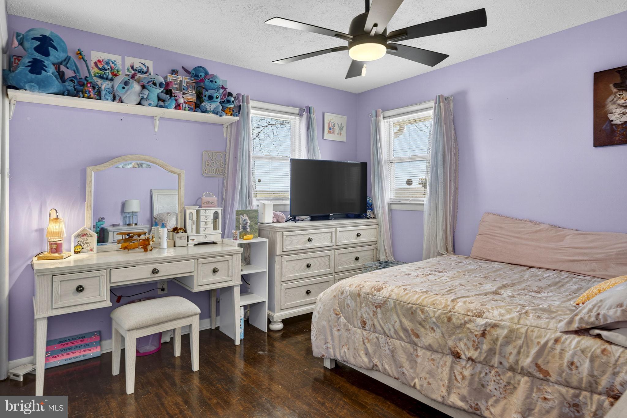 110 Bucks Mill Road Strasburg, VA 22657 - Photo 29 of 53 a bedroom with a bed and a flat screen tv