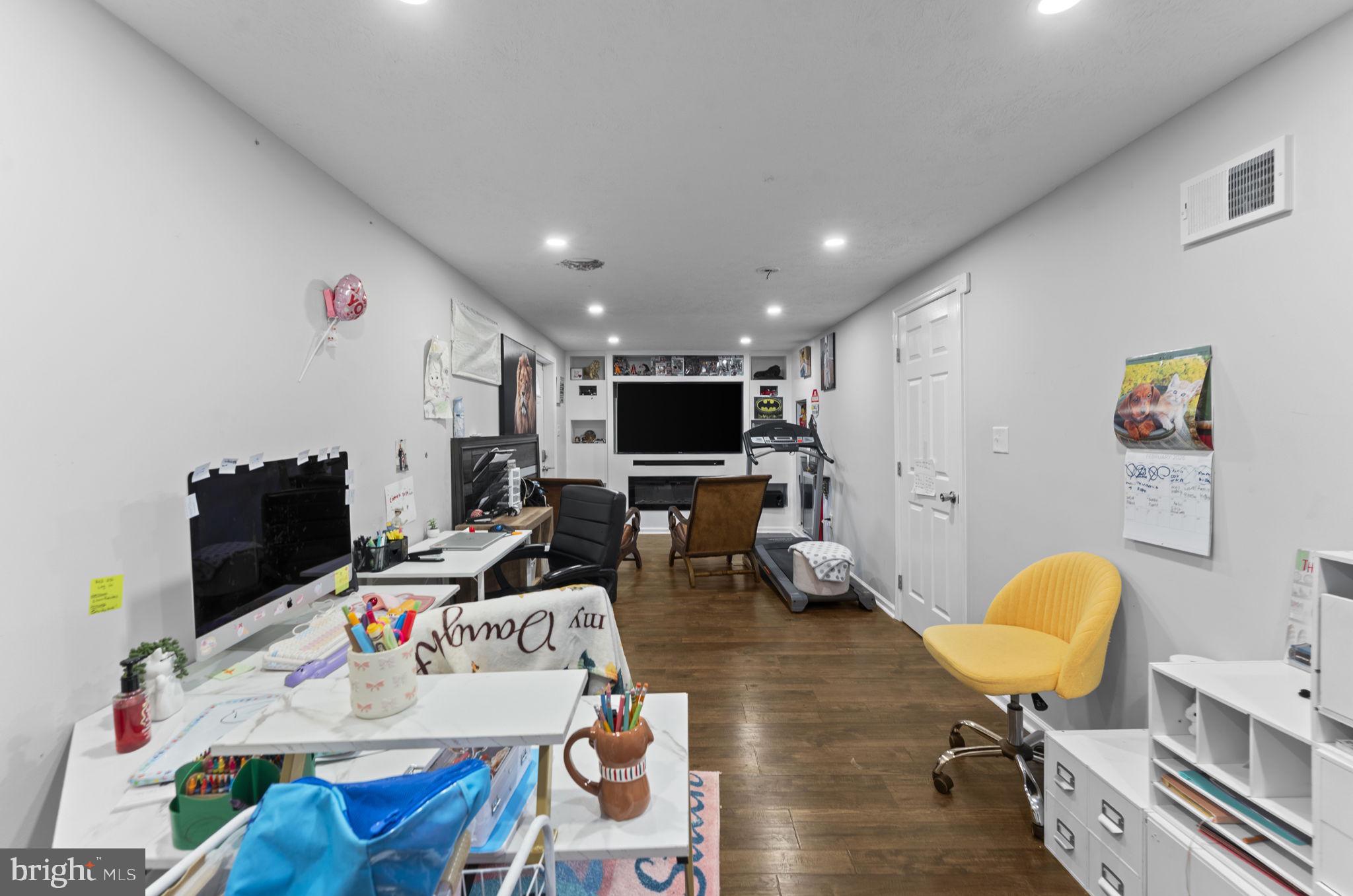 110 Bucks Mill Road Strasburg, VA 22657 - Photo 39 of 53 a living room with furniture and a flat screen tv