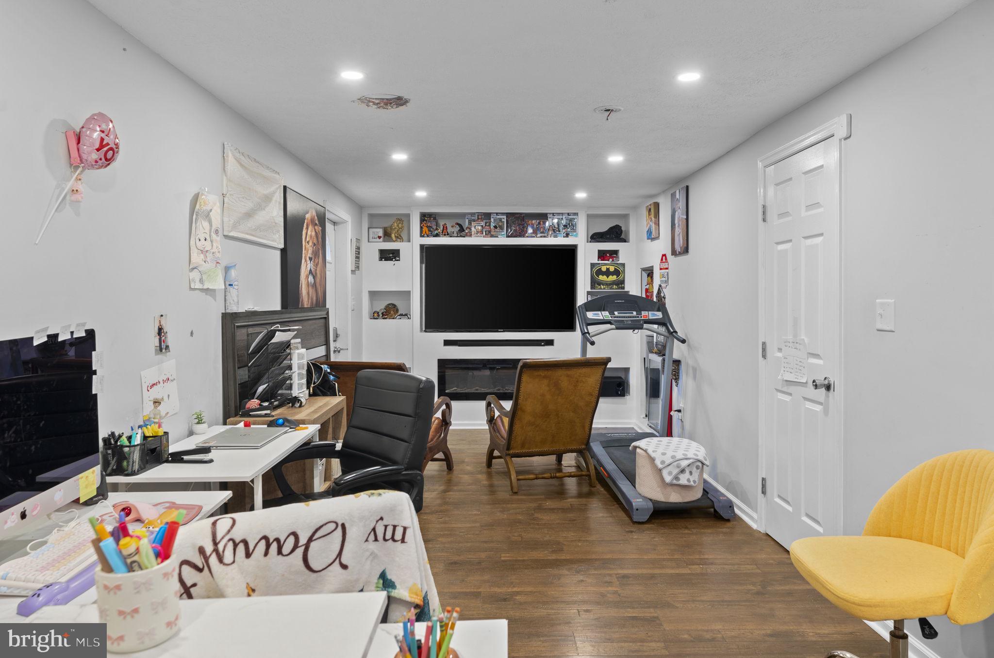 110 Bucks Mill Road Strasburg, VA 22657 - Photo 40 of 53 a living room with furniture and a flat screen tv