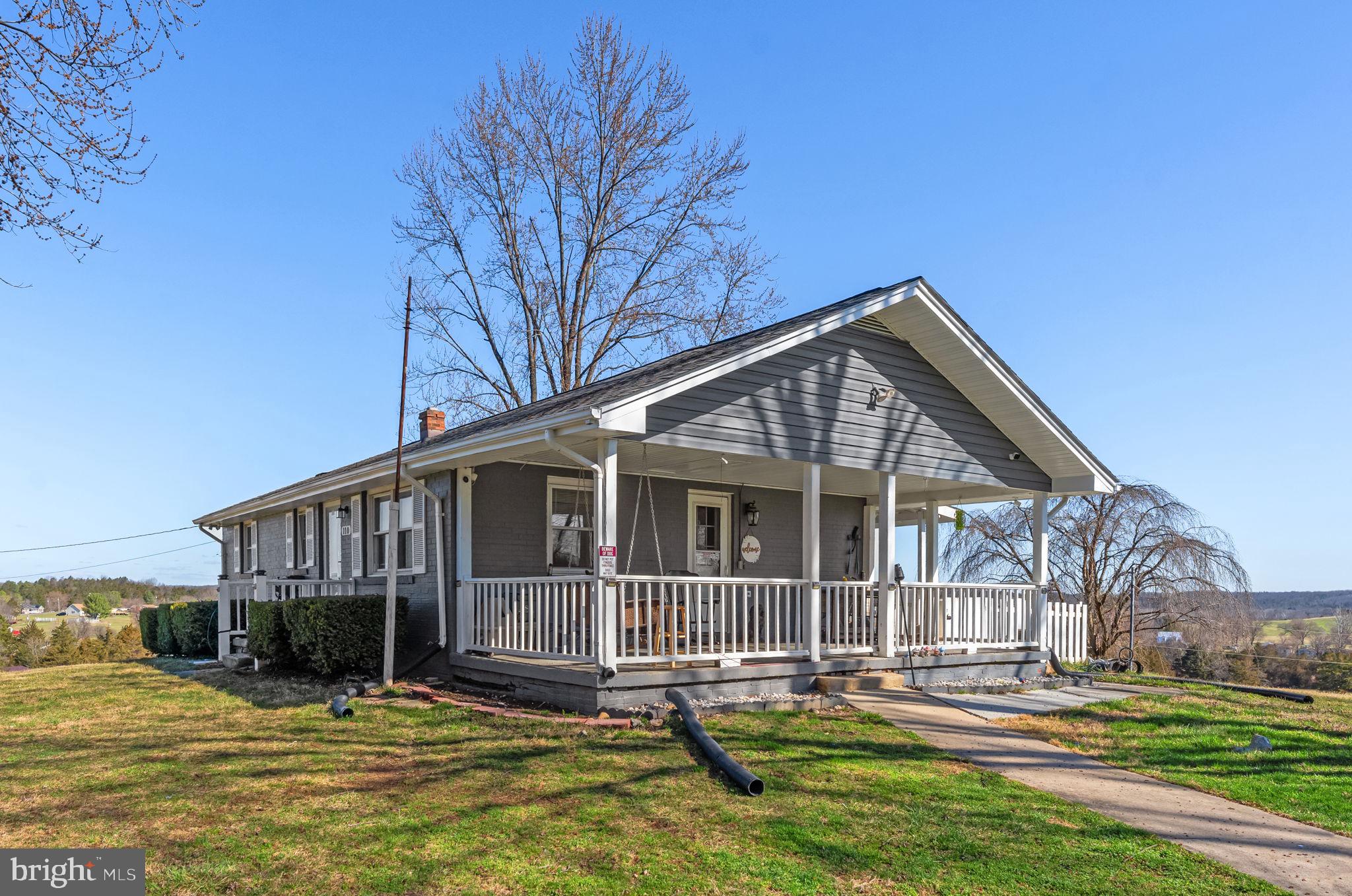 110 Bucks Mill Road Strasburg, VA 22657 - Photo 44 of 53 a view of a house with a yard