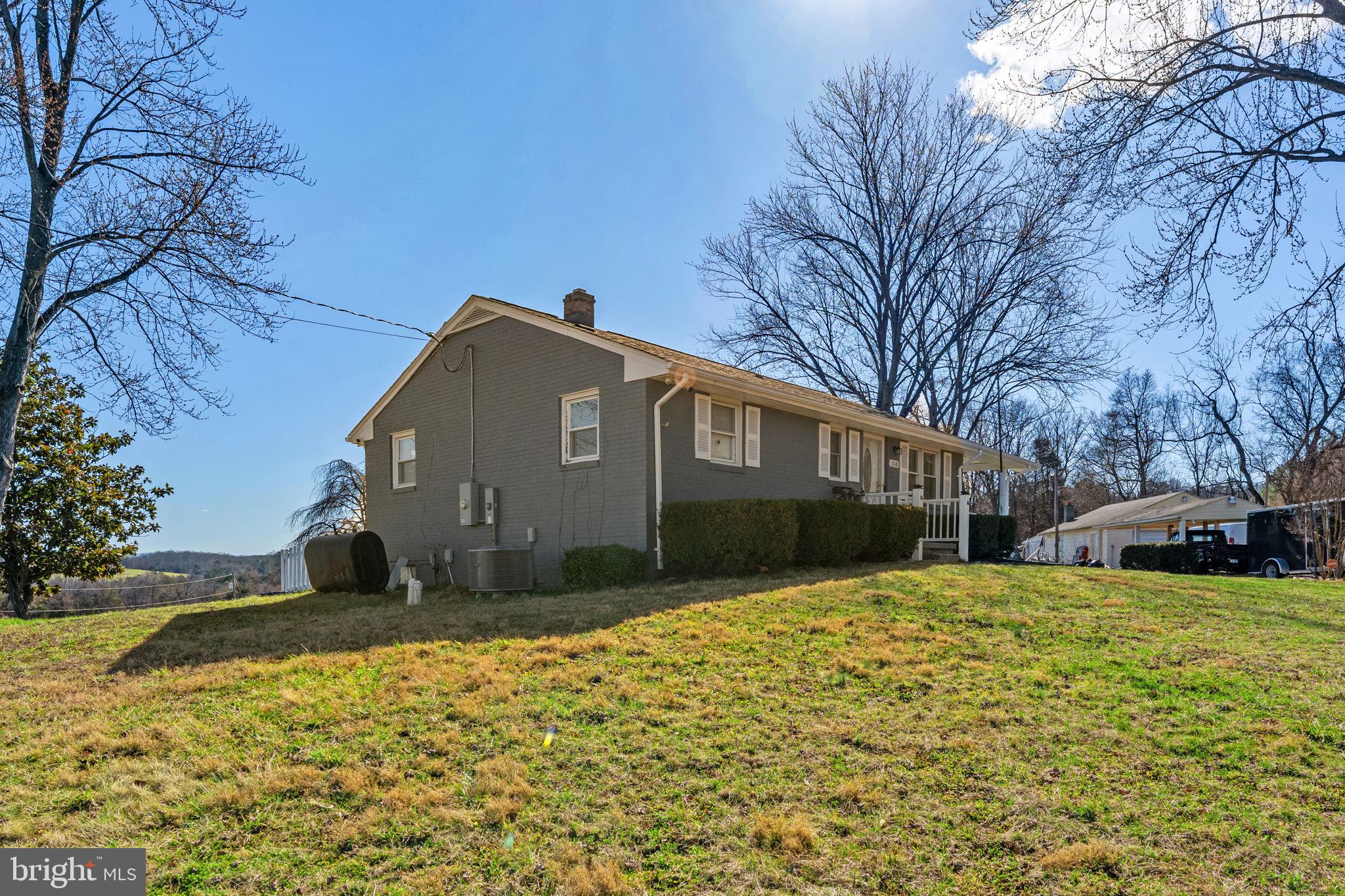 110 Bucks Mill Road Strasburg, VA 22657 - Photo 47 of 53 a view of a yard with a house