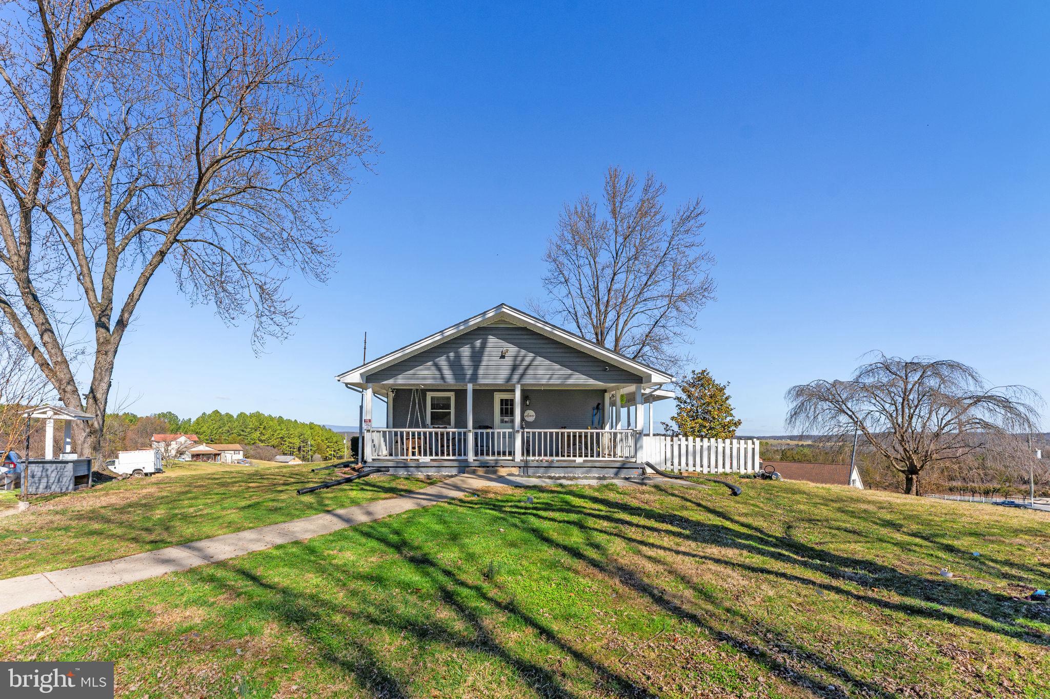 110 Bucks Mill Road Strasburg, VA 22657 - Photo 51 of 53 a front view of a house with a yard