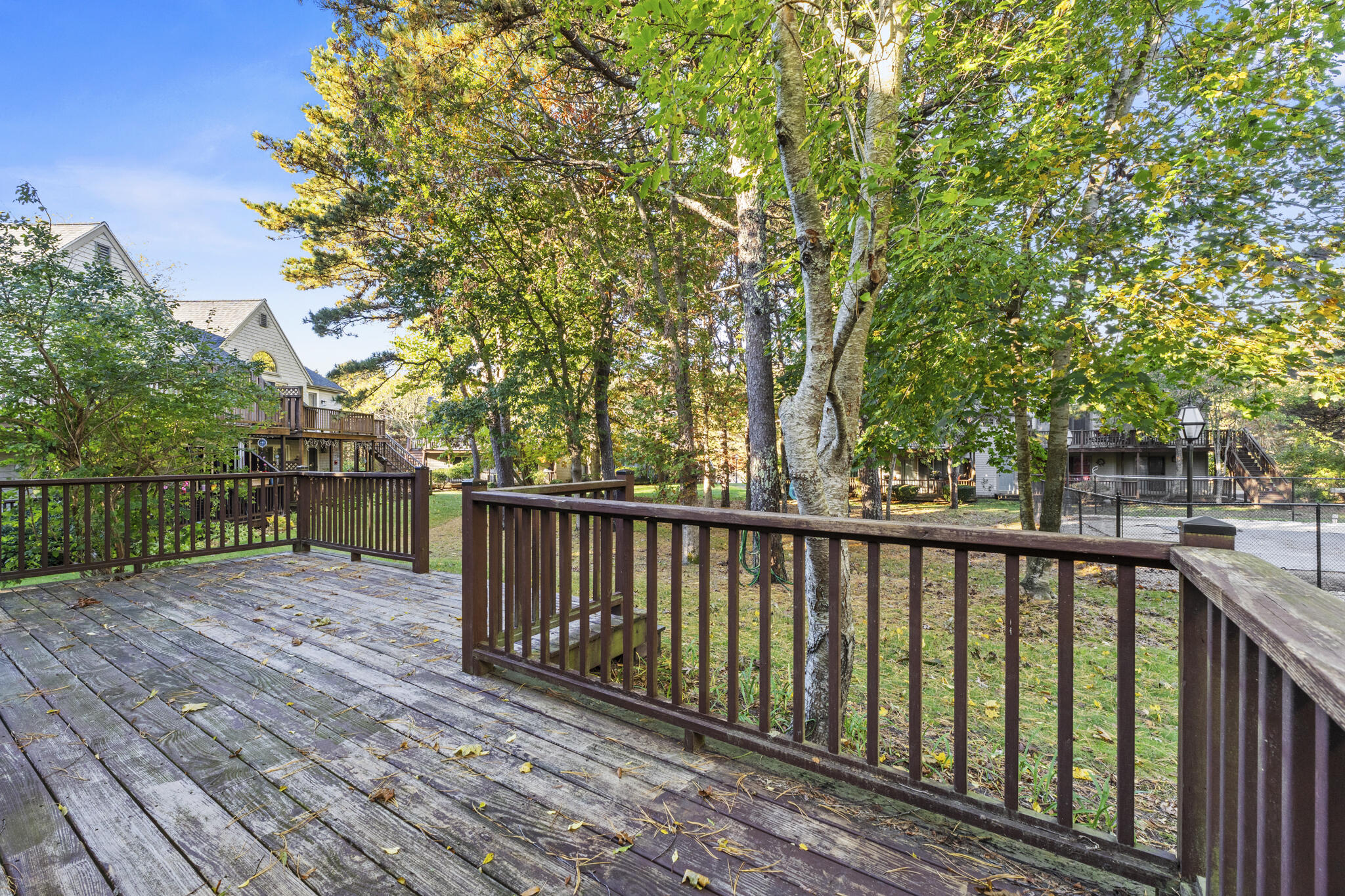 24 Ryan's Way, Unit 6 Mashpee, MA 02649 - Photo 19 of 23 a view of wooden deck
