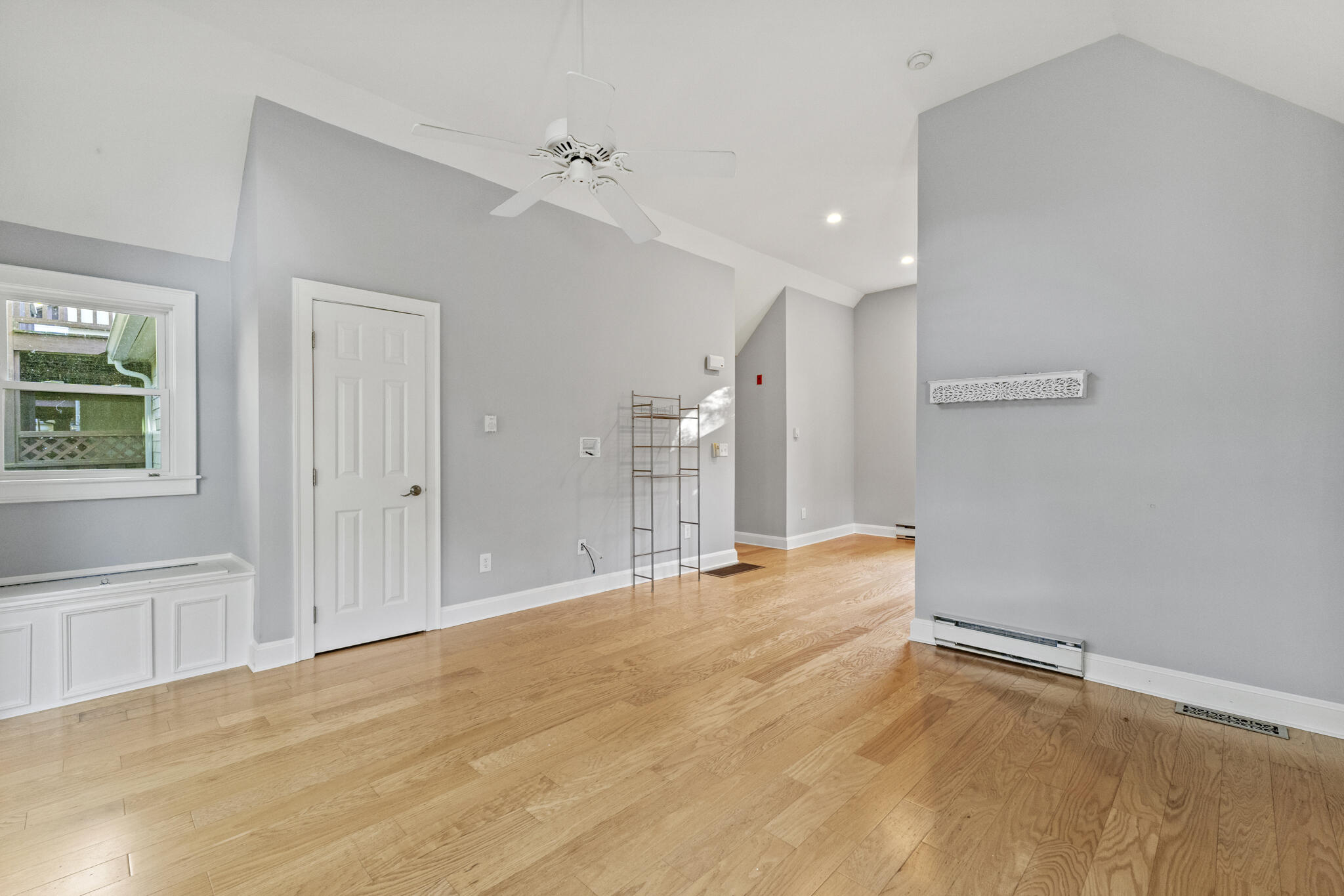 24 Ryan's Way, Unit 6 Mashpee, MA 02649 - Photo 4 of 23 a view of an empty room with a window