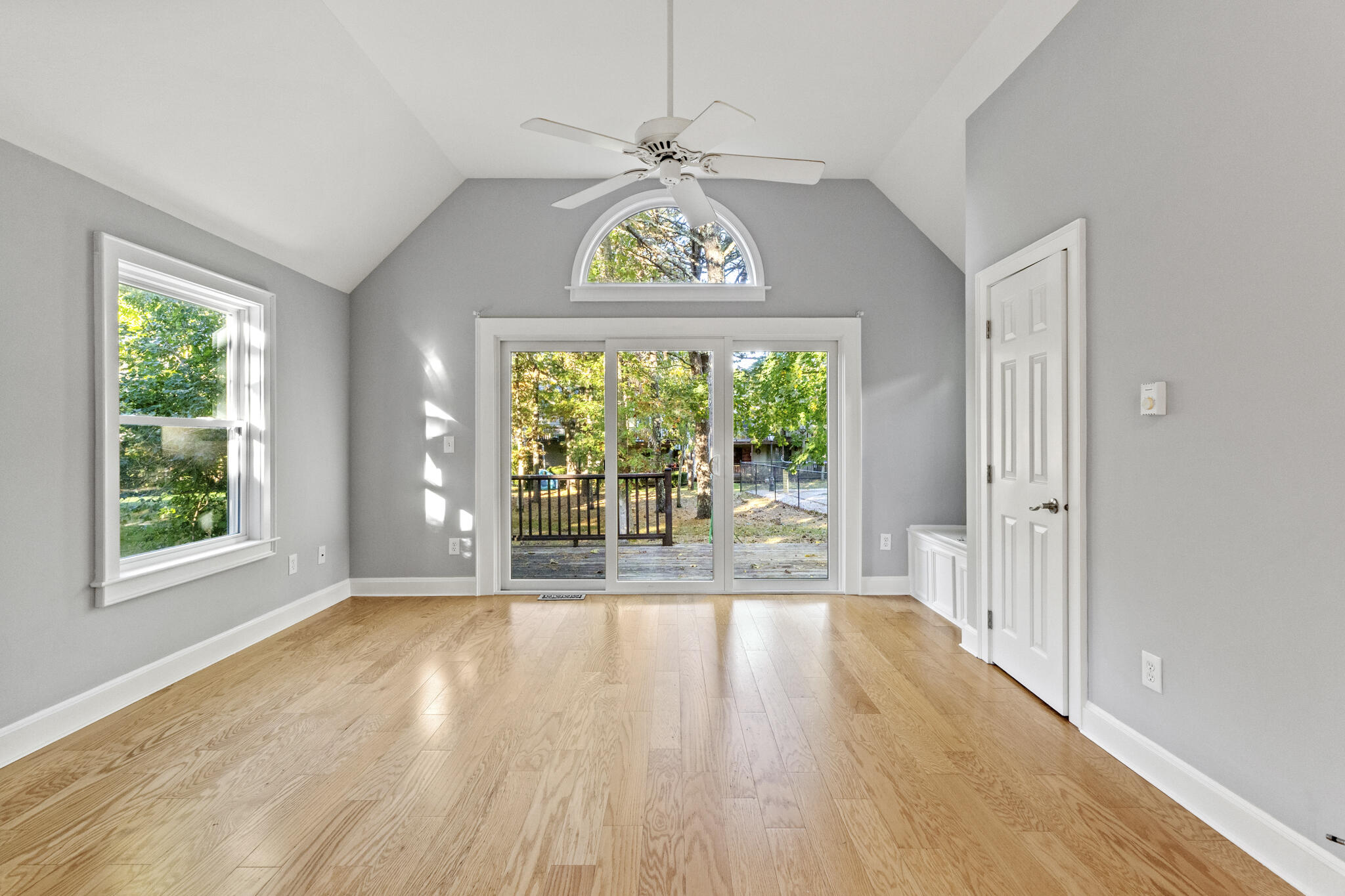 24 Ryan's Way, Unit 6 Mashpee, MA 02649 - Photo 6 of 23 wooden floor in an empty room with a window
