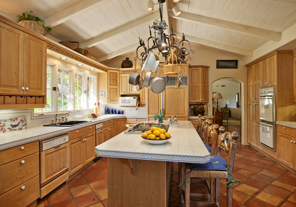 669 Hot Springs Road Montecito, CA 93108 - Photo 13 of 26 a view of a kitchen area with furniture and chandelier