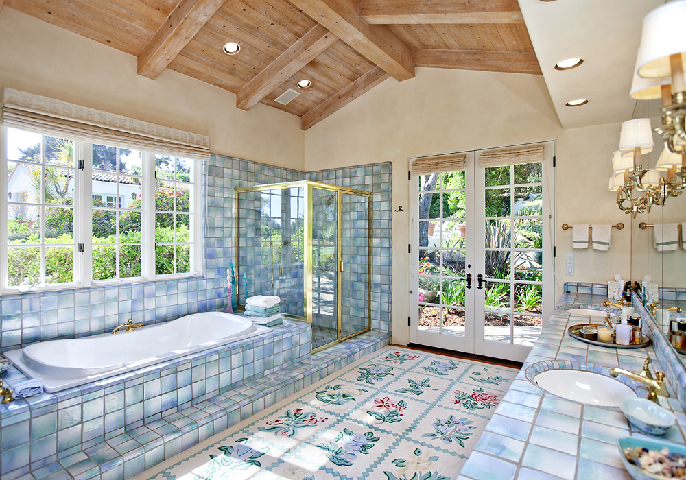 669 Hot Springs Road Montecito, CA 93108 - Photo 15 of 26 a spacious bedroom with a bed and glass door