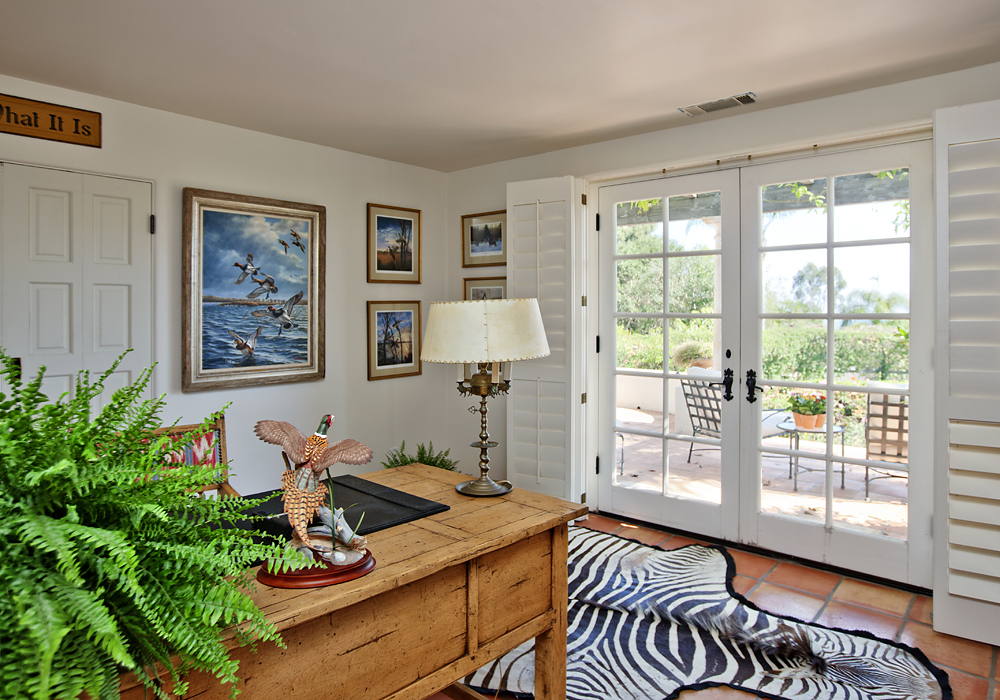 669 Hot Springs Road Montecito, CA 93108 - Photo 16 of 26 a living room with furniture and a window