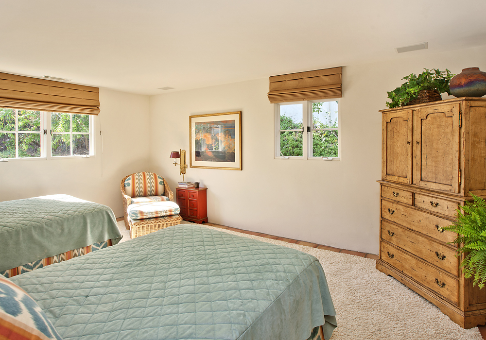 669 Hot Springs Road Montecito, CA 93108 - Photo 19 of 26 a bedroom with a bed and a dresser