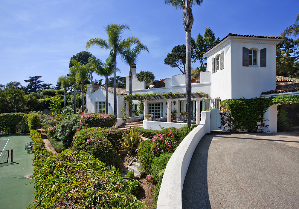 669 Hot Springs Road Montecito, CA 93108 - Photo 2 of 26 a view of a house with a yard and potted plants