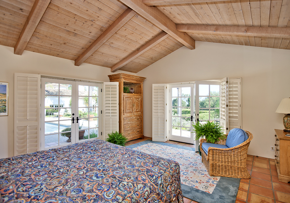 669 Hot Springs Road Montecito, CA 93108 - Photo 21 of 26 a room with furniture and a potted plant