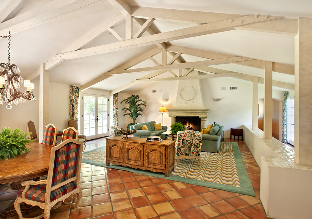 669 Hot Springs Road Montecito, CA 93108 - Photo 9 of 26 a living room with furniture a fireplace and a chandelier
