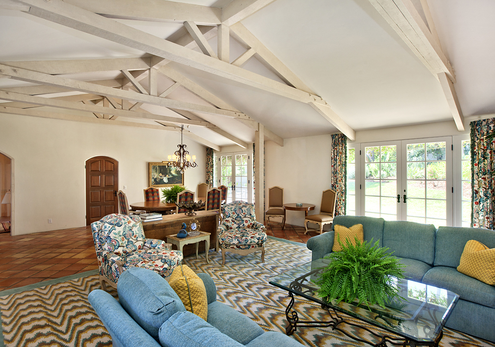 669 Hot Springs Road Montecito, CA 93108 - Photo 10 of 26 a living room with furniture fireplace and a large window