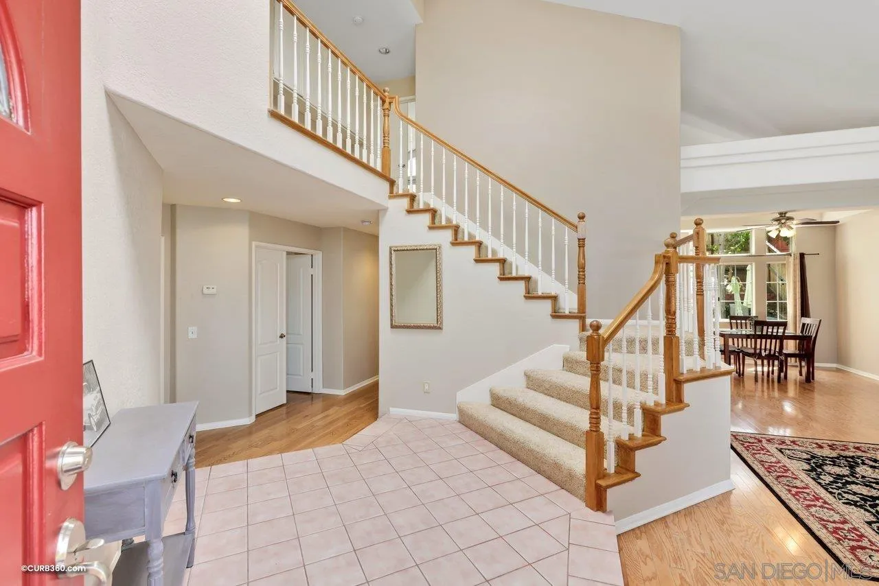 5138 Vía Madrid Oceanside, CA 92057 - Photo 4 of 32 a view of entryway and hall with wooden floor